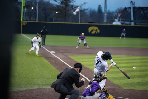 Iowa utility and pitcher Keaton Anthony prepares to hit the ball during a baseball game at Duane Baseball Field in Iowa City on Tuesday, Feb. 28, 2023. The Hawkeyes defeated the Duhawks, 9-2. Anthony had two runs.