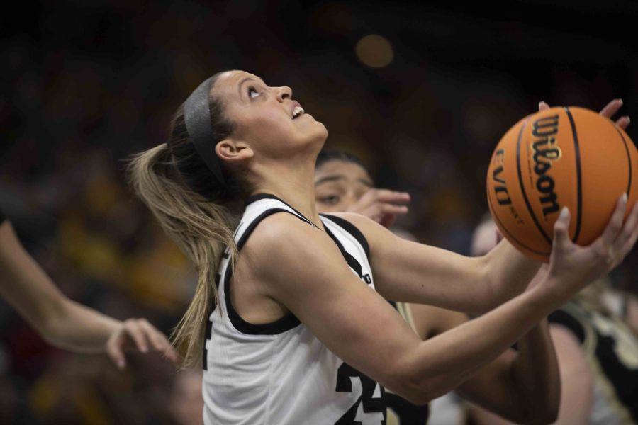 Iowa guard Gabbie Marshall tosses the ball for a layup during a women’s basketball game between No. 7 Iowa and Purdue at Target Center in Minneapolis on Friday, March 3, 2023. The Hawkeyes defeated the Boilermakers, 69-58. Marshall scored 11 points.