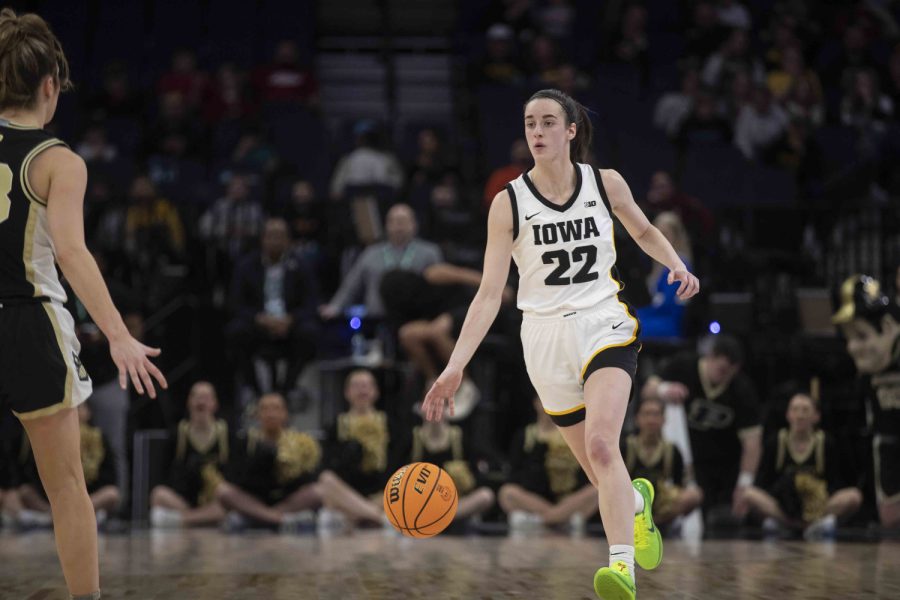 Iowa guard Caitlin Clark runs with the ball during a women’s basketball game between No. 7 Iowa and Purdue at Target Center in Minneapolis on Friday, March 3, 2023. The Hawkeyes defeated the Boilermakers, 69-58. Clark scored 22 points and had 8 rebounds.