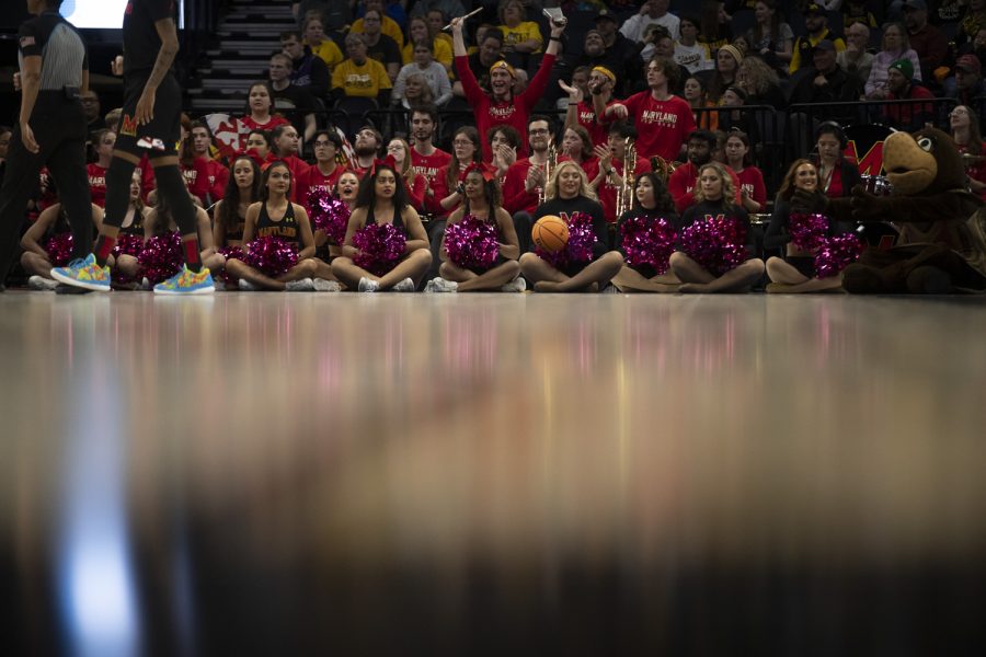 The ball rolls past Maryland cheerleaders after Maryland scores during a women’s basketball game between No. 7 Iowa and No. 5 Maryland at Target Center in Minneapolis on Saturday, March 4, 2023. The Hawkeyes defeated the Terrapins, 89-84.