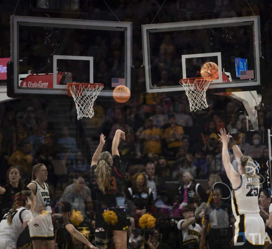 In this multiple exposure image, Maryland forward Faith
Masonius and Iowa center Monika Czinano shoot free-throws during a women’s basketball game between No. 7 Iowa and No. 5 Maryland at Target Center in Minneapolis on Saturday, March 4, 2023. The Hawkeyes defeated the Terrapins, 89-84.