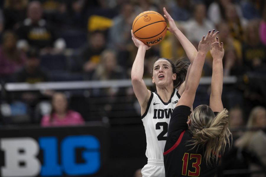 Iowa guard Caitlin Clark shoots the ball during a women’s basketball game between No. 7 Iowa and No. 5 Maryland at Target Center in Minneapolis on Saturday, March 4, 2023. The Hawkeyes defeated the Terrapins, 89-84. Clark scored 22 points and has 9 assists.