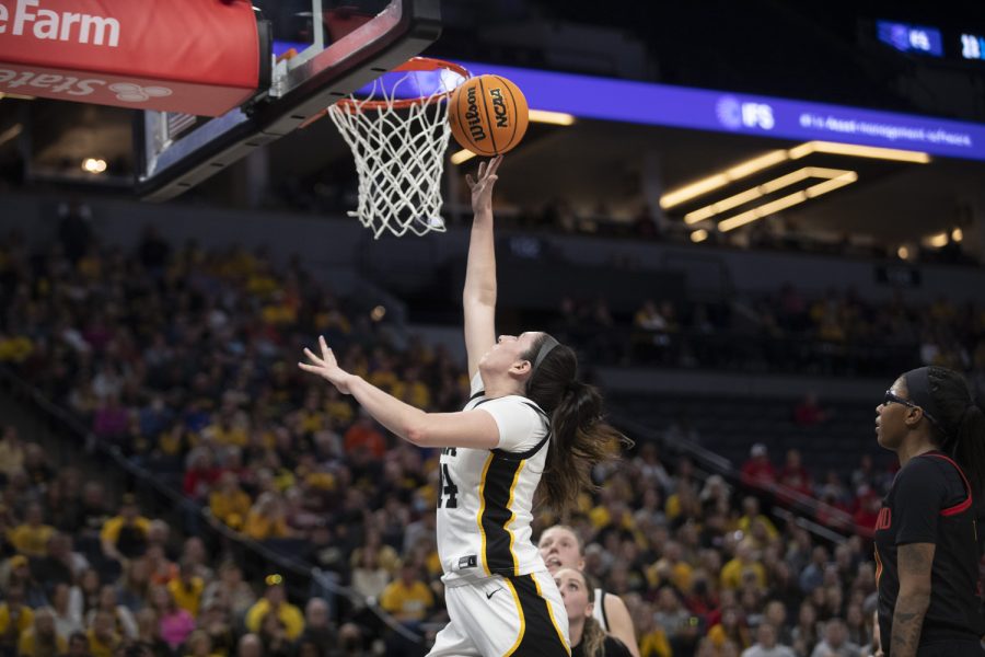 Iowa forward McKenna Warnock makes a layup during a women’s basketball game between No. 7 Iowa and No. 5 Maryland at Target Center in Minneapolis on Saturday, March 4, 2023. The Hawkeyes defeated the Terrapins, 89-84. Warnock scored 21 points and had 8 rebounds.