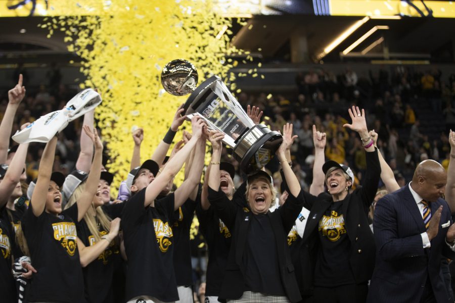 Iowa players celebrate after winning the Big 10 women’s basketball tournament after a game between No. 7 nationally ranked, second-seeded Iowa and No. 14 nationally ranked, fourth-seeded Ohio State at Target Center in Minneapolis on Sunday, March 5, 2023. The Hawkeyes defeated the Buckeyes, 105-72.