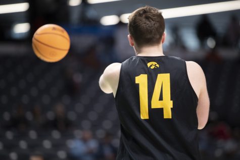 Iowa guard Carter Kingsbury passes the ball to a teammate during a team practice at Legacy Arena in Birmingham, Alabama on Wednesday, March 15, 2023. Auburn faces Iowa on Thursday.