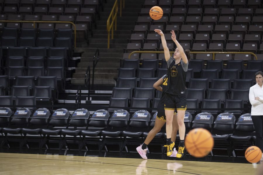Iowa guard Caitlin Clark shoots a three-point shot during the 2023 NCAA First Round women’s basketball pre-game press conferences and open practices at Carver-Hawkeye Arena on Thursday, March 16, 2023.