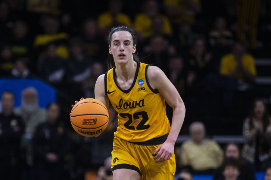 Iowa guard Caitlin Clark runs the ball down the court during a 2023 NCAA First Round women’s basketball game between No. 2 Iowa and No. 16 Southeastern Louisiana in sold-out Carver-Hawkeye Arena on Friday, March 16, 2023.