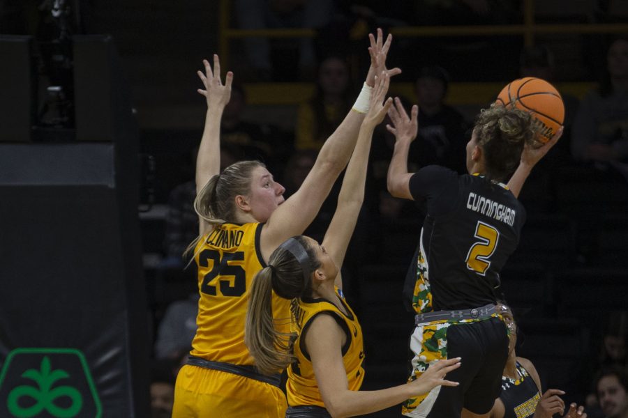 Iowa center Monika Czinano and Iowa guard Gabbie Marshall attempt to block a shot from Southeastern Louisiana guard Cierria Cunningham during a 2023 NCAA First Round women’s basketball game between No. 2 Iowa and No. 16 Southeastern Louisiana in sold-out Carver-Hawkeye Arena on Friday, March 16, 2023. The Hawkeyes defeated the Lions, 95-43.