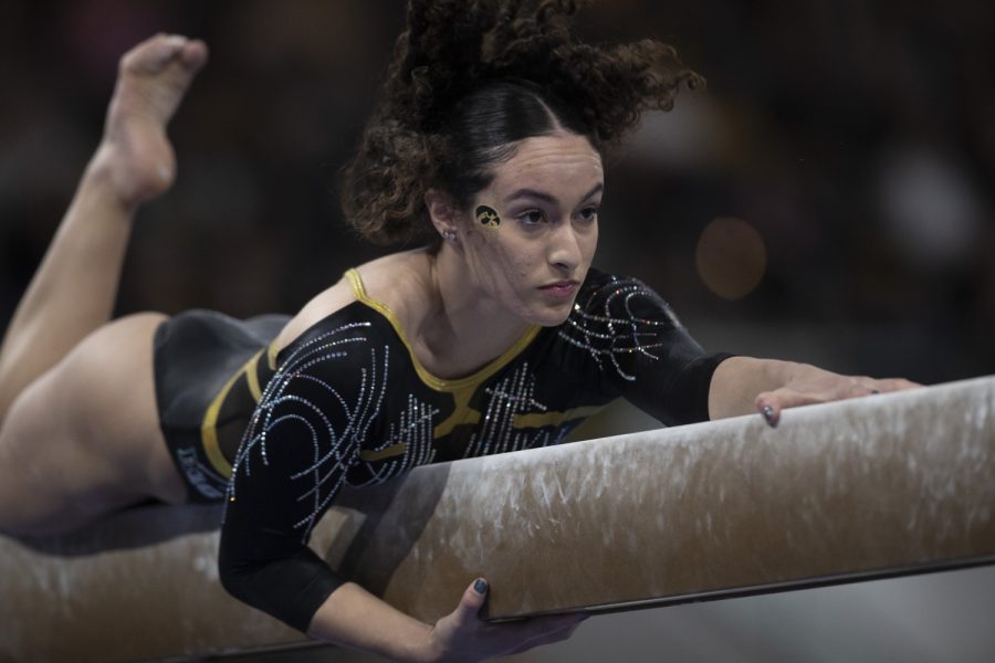Iowas Karina Muñoz competes on beam during session two of the Big Ten Gymnastics Championship at Xtream Arena in Coralville, Iowa, on Saturday, March 18, 2023. Michigan won the Big Ten women’s gymnastics title with a score of 198.000.