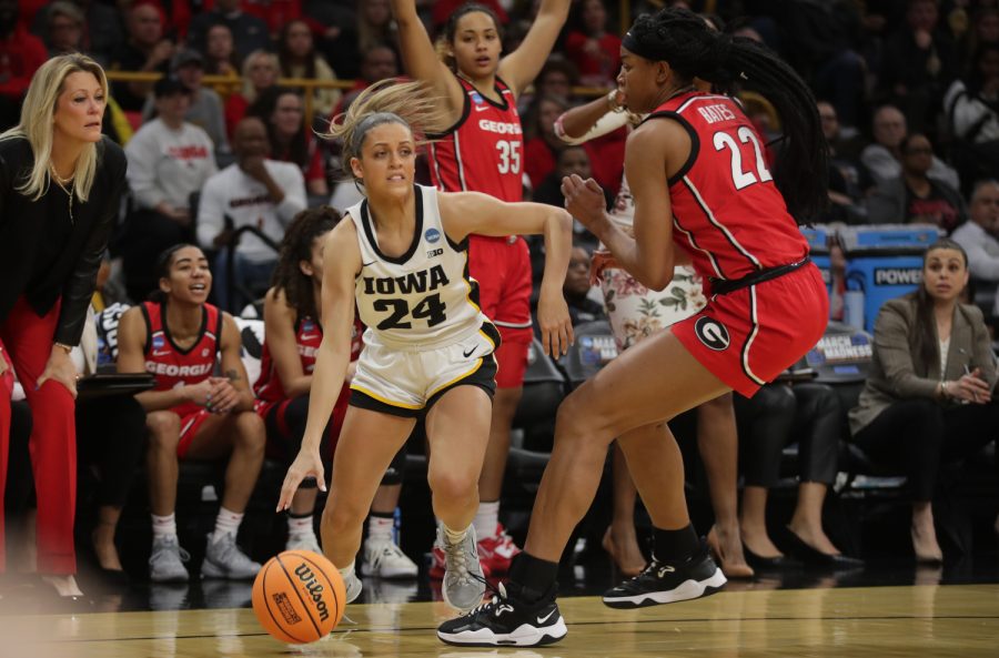 Iowa womens basketball senior guard Gabbie Marshall dribbles the ball in an NCAA Tournament second-round game against 10th-seeded Georgia at Carver-Hawkeye Arena. Iowa won, 74-66, to advance to the Sweet 16 in Seattle.
