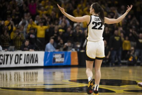 Iowa guard Caitlin Clark hypes up the crowd during the 2023 NCAA Second Round women’s basketball game between No.2 Iowa and No.10 Georgia at a sold-out Carver Hawkeye Arena on Sunday, March 19, 2022. The Hawkeyes defeated the Lady Bulldogs, 74-66.