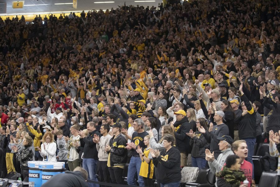 Fans react after the 2023 NCAA Second Round women’s basketball game between No.2 Iowa and No.10 Georgia at a sold-out Carver Hawkeye Arena on Sunday, March 19, 2022. The Hawkeyes defeated the Lady Bulldogs, 74-66.