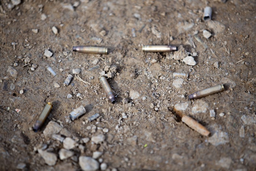 Bullet shells are seen on the ground at the Hawkeye Wildlife Shooting Range in Amana, Iowa on March 20, 2023.