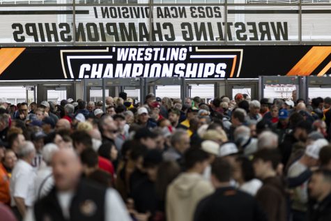 Fans enter BOK Center before session one of the NCAA Wrestling Championships in Tulsa, Okla. on Thursday, March 16, 2023.
