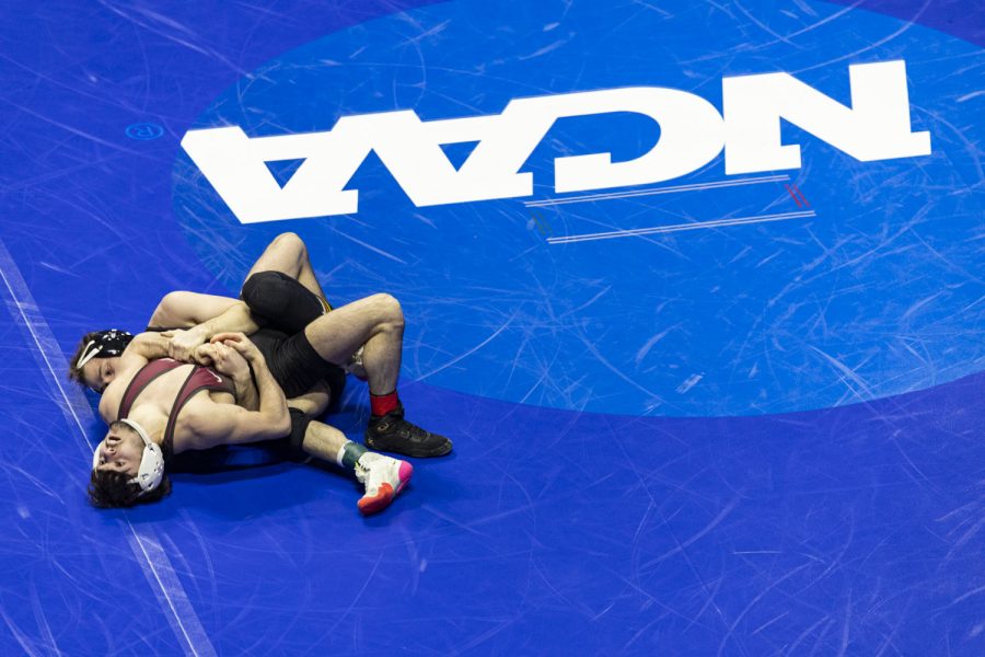 No. 1 seeded 125-pound Iowas Spencer Lee wrestles No. 8 seeded 125-pound Lock Havens Anthony Noto during session three of the NCAA Wrestling Championships at BOK Center in Tulsa, Okla. on Friday, March 17, 2023. Lee defeated Noto by major decision, 14-4.