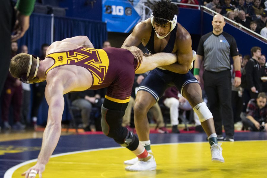 No.1 seeded 174-pound Penn State’s Carter Starocci wrestles Minnesota’s No.4 Bailee O,Reily during session two of the Big Ten Wrestling Championships at Crisler Center in Ann Arbor, Mich. on Saturday, March. 4, 2023. Starroci defeated O,Reily, 8-2.