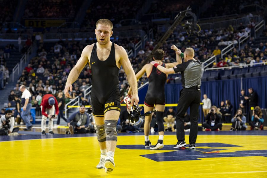 No.+3+seeded+165-pound+Iowas+Patrick+Kennedy+walks+off+the+mat+after+losing+to+No.+1+seeded+Dean+Hamiti+during+session+four+of+the+Big+Ten+Wrestling+Championships+at+Crisler+Center+in+Ann+Arbor%2C+Mich.+on+Sunday%2C+March+5%2C+2023.+Hamiti+defeated+Kennedy+by+decision%2C+9-6%2C+for+the+165-pound+championship+title.