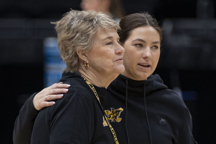 Iowa head coach Lisa Bluder talks to director of operations Hannah Bluder during the 2023 NCAA Sweet Sixteen press conferences and practices at Climate Pledge Arena in Seattle, WA on Thursday, March 24, 2023.