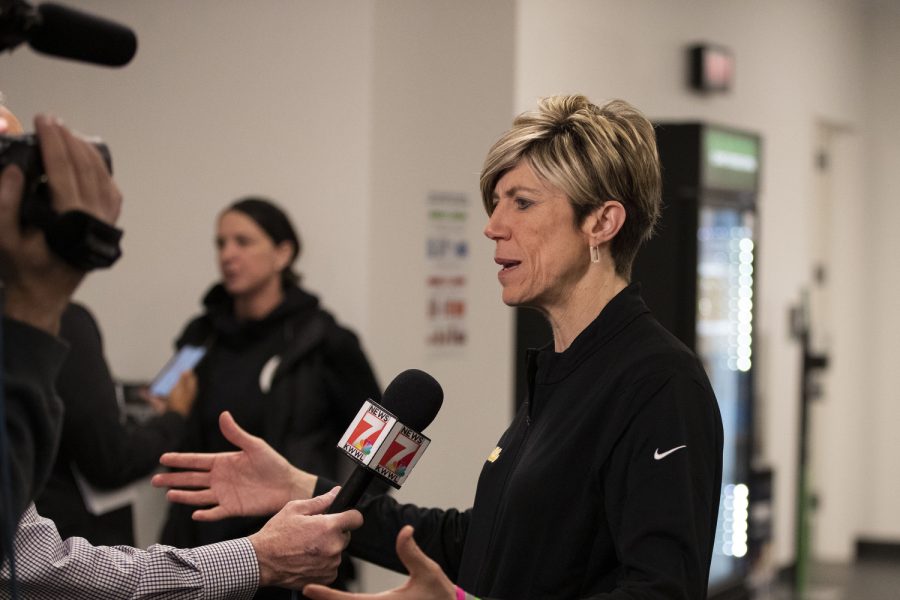 Iowa associate head coach Jan Jensen talks to the media during the NCAA Elite Eight press conferences at Climate Pledge Arena in Seattle, WA, on Sat., March 25, 2023.