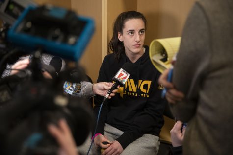 Iowa guard Caitlin Clark answers questions from the media during the NCAA Elite Eight press conferences at Climate Pledge Arena in Seattle, WA, on Sat., March 25, 2023.