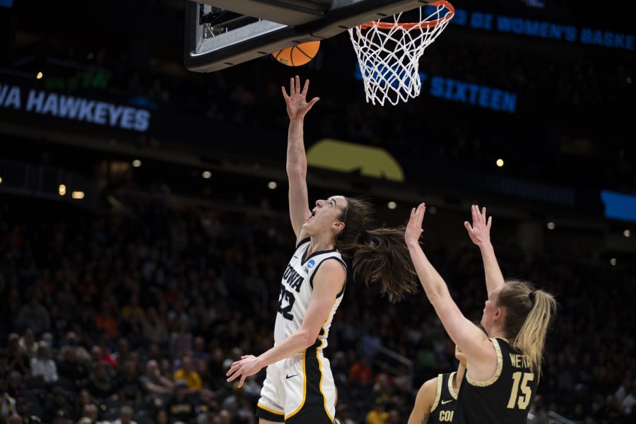 Iowa guard Caitlin Clark attempts a layup during the 2023 NCAA Sweet Sixteen women’s basketball game between No.2 Iowa and No.6 Colorado at Climate Pledge Arena in Seattle, WA on Friday, March 24, 2023. The Hawkeyes defeated the Buffaloes, 87-77.