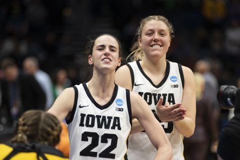 Iowa guard Caitlin Clark and Iowa center Monika Czinano celebrate after a victory over No.6 Colorado at the 2023 NCAA Tournament Sweet 16 at Climate Pledge Arena in Seattle, WA on March 24, 2023.
