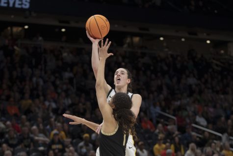 Iowa guard Caitlin Clark shoots a jump shot during the 2023 NCAA Sweet Sixteen women’s basketball game between No.2 Iowa and No.6 Colorado at Climate Pledge Arena in Seattle, WA on Friday, March 24, 2023. The Buffalos leads The Hawkeyes, 40-39.