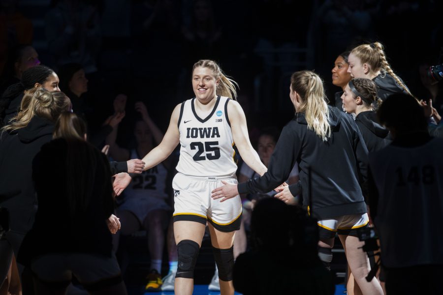 Iowa+center+Monika+Czinano+walks+during+introductions+before+a+2023+NCAA+Elite+Eight+women%E2%80%99s+basketball+game+between+No.2+Iowa+and+No.5+Louisville+at+Climate+Pledge+Arena+in+Seattle%2C+WA+on+Sunday%2C+March+26%2C+2023.