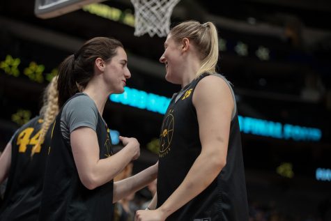 Iowa players Caitlin Clark and Monika Czinano interact during a 2023 NCAA Final Four press conferences and open practices at American Airlines Center in Dallas, Texas on Thursday, March 30, 2023.