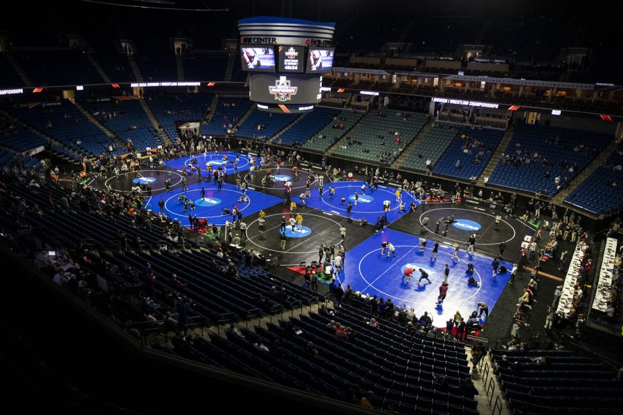 Wrestlers warm up before session one of the NCAA Wrestling Championships at BOK Center in Tulsa, Okla. on Thursday, March 16, 2023. 