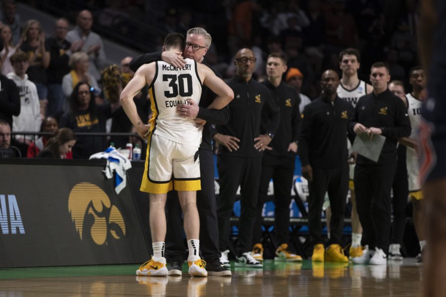 Iowa+guard+Connor+McCaffery+embraces+Iowa+head+coach+and+father+Fran+McCaffery+after+stepping+off+the+court+for+the+final+time+in+his+college+career+during+a+men%E2%80%99s+basketball+game+between+Iowa+and+Auburn+in+the+first+round+of+the+NCAA+Tournament+at+Legacy+Arena+in+Birmingham%2C+Alabama+on+Thursday%2C+March+16%2C+2023.+The+Tigers+defeated+the+Hawkeyes%2C+83-75.