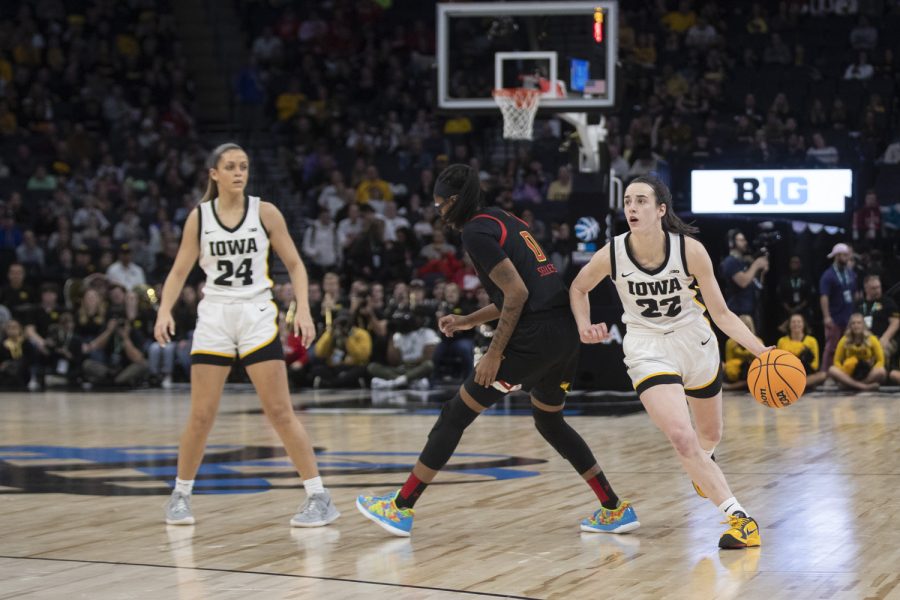 Iowa+guard+Caitlin+Clark+runs+with+the+ball+during+a+women%E2%80%99s+basketball+game+between+No.+7+Iowa+and+No.+5+Maryland+at+Target+Center+in+Minneapolis+on+Saturday%2C+March+4%2C+2023.+The+Hawkeyes+defeated+the+Terrapins%2C+89-84.+Clark+scored+22+points+and+had+9+assists.