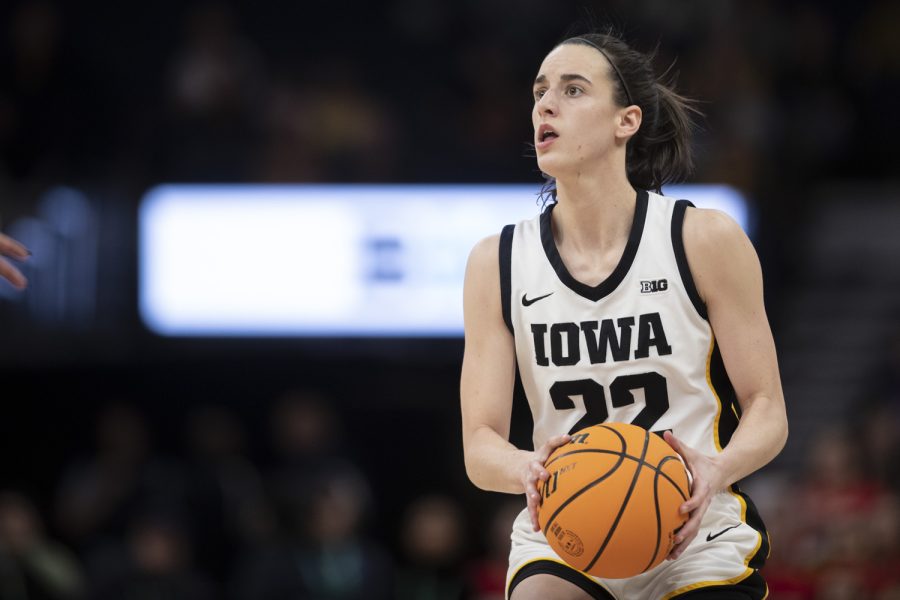 Iowa guard Caitlin Clark prepares to shoot the ball during a women’s basketball game between No. 7 Iowa and No. 5 Maryland at Target Center in Minneapolis on Saturday, March 4, 2023. The Hawkeyes defeated the Terrapins, 89-84. Clark scored 22 points and had 9 assists.