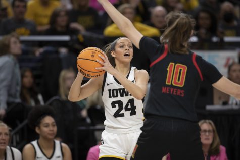 Iowa guard Gabbie Marshall looks to pass the ball during a women’s basketball game between No. 7 Iowa and No. 5 Maryland at Target Center in Minneapolis on Saturday, March 4, 2023. The Hawkeyes defeated the Terrapins, 89-84. Marshall scored 21 points.