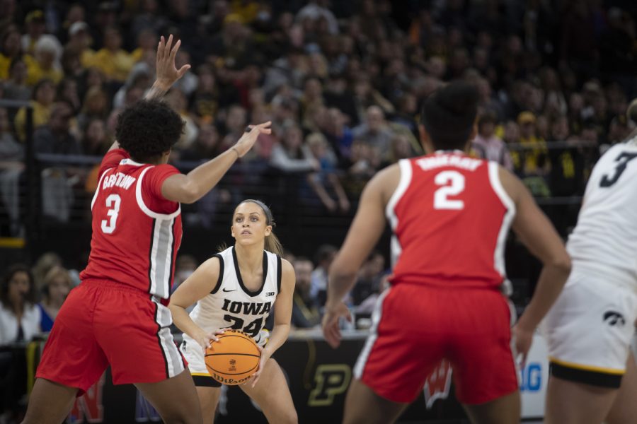 Iowa guard Gabbie Marshall looks to shoot the ball during a game between No. 7 Iowa and No. 14 Ohio State at Target Center in Minneapolis on Sunday, March 5, 2023. The Hawkeyes defeated the Buckeyes, 105-72.