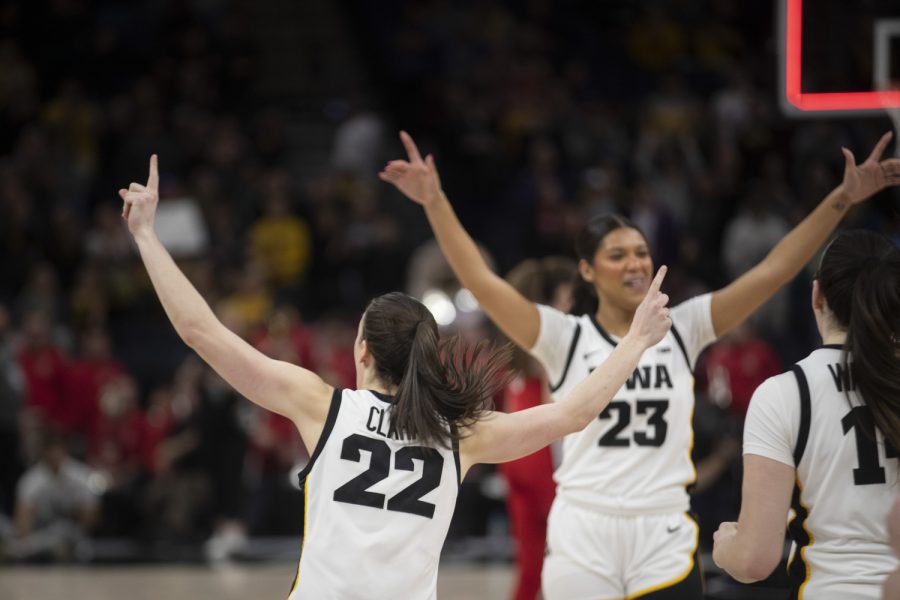 Iowa guard Caitlin Clark celebrates after winning a game between No. 7 Iowa and No. 14 Ohio State at Target Center in Minneapolis on Sunday, March 5, 2023. The Hawkeyes defeated the Buckeyes, 105-72.