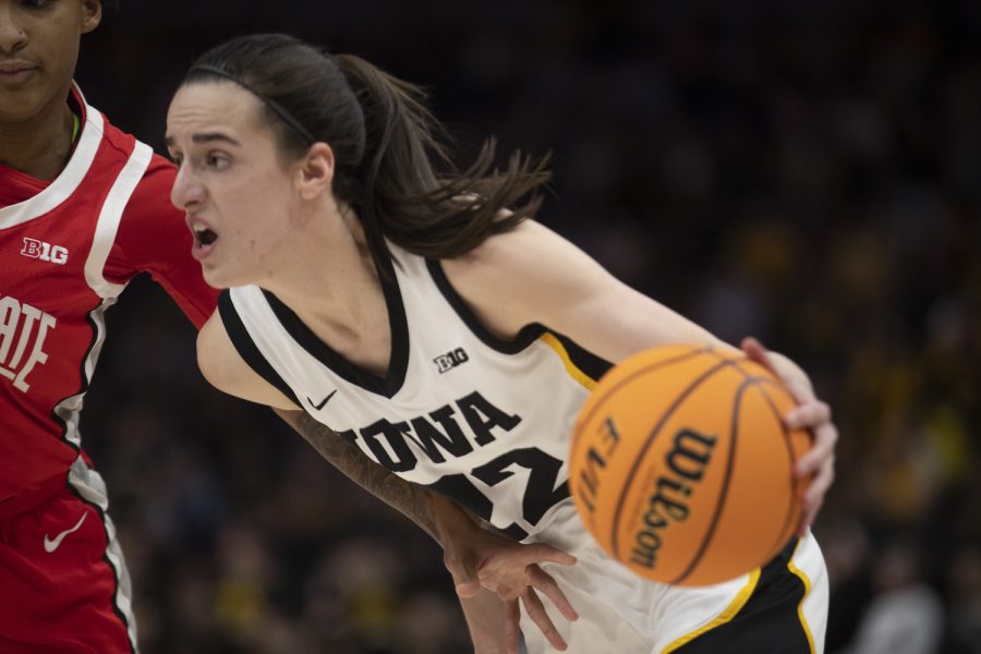 Iowa guard Caitlin Clark goes for a layup during a game between No. 7 Iowa and No. 14 Ohio State at Target Center in Minneapolis on Sunday, March 5, 2023. The Hawkeyes defeated the Buckeyes, 105-72.