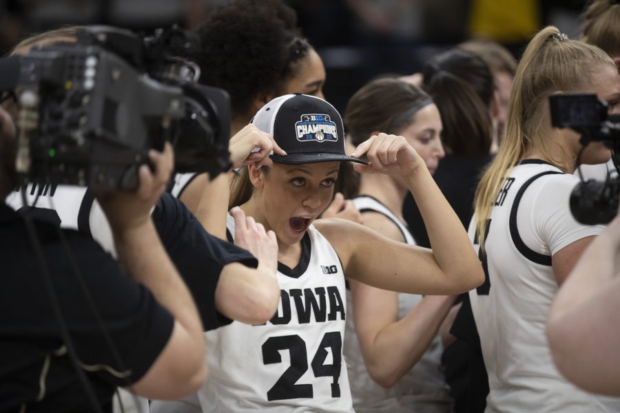 Iowa guard Gabbie Marshall celebrates after winning the Big Ten women’s basketball tournament after a game between No. 7 Iowa and No. 14 Ohio State at Target Center in Minneapolis on Sunday, March 5, 2023. The Hawkeyes defeated the Buckeyes, 105-72.