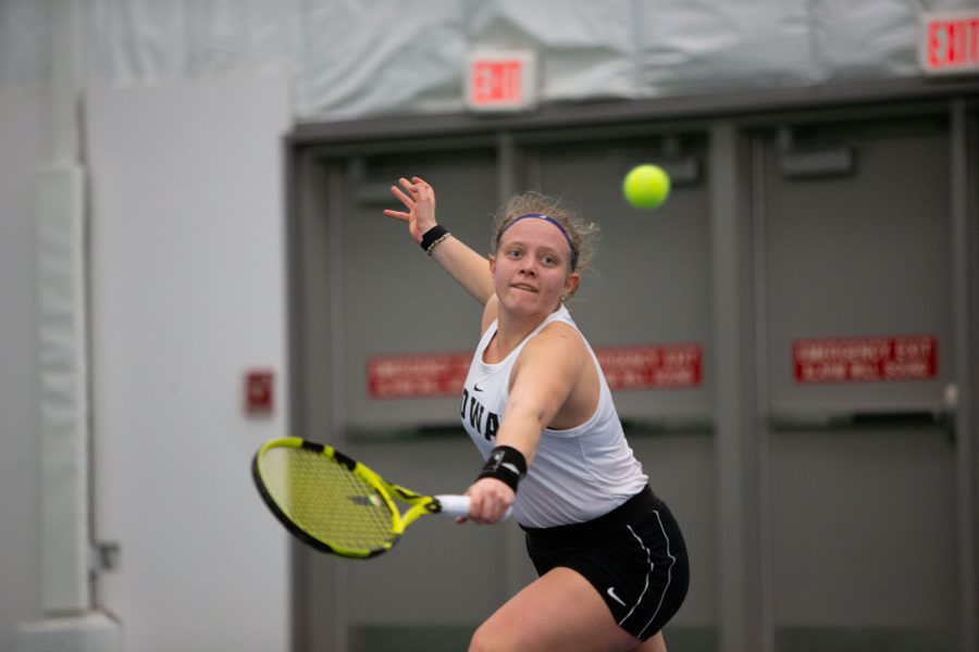 Iowa’s Barbora Pokorna prepares to hit the ball during a tennis meet at the Hawkeye Tennis & Recreational Complex in Iowa City on Friday, March 31, 2023. Pokorna won her doubles match.