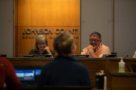 Chairperson Lisa Green-Douglass and Vice-chairperson Rod Sullivan laughing during the Johnson County Board of Supervisors meeting in the Johnson County Administration Building on Wednesday, April 19, 2023. 