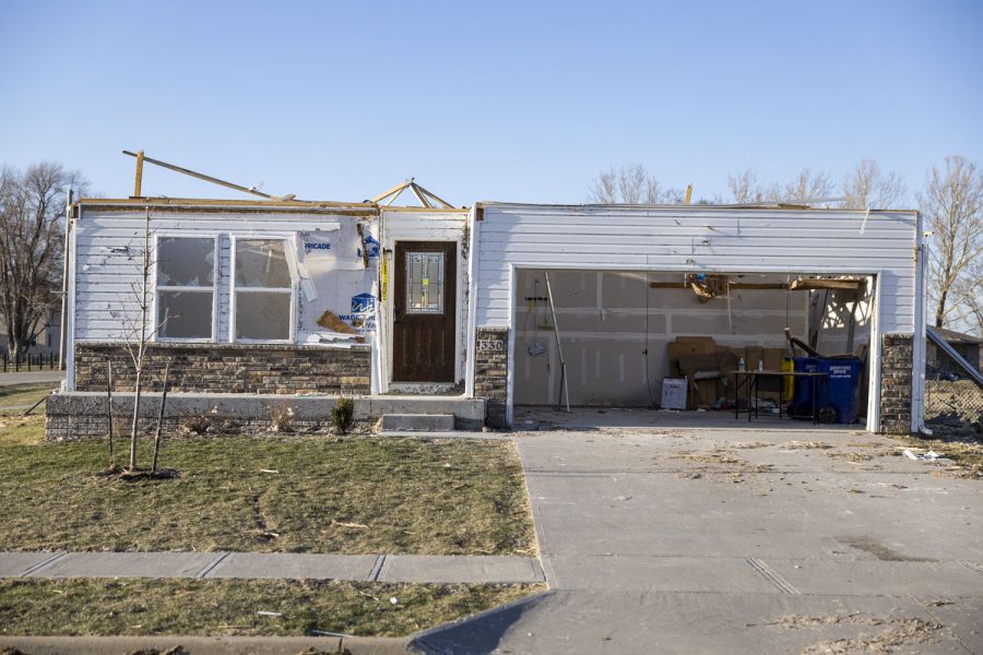 A damaged house is seen at the corner of Old Oak Ridge and Highway F62 in Hills, Iowa on Saturday, April 1, 2023 after a tornado went through parts of the town on Friday. The tornado impacted a new development in the city of 902 people.