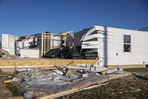 A damaged house is seen at the corner of Old Oak Ridge and Highway F62 in Hills, Iowa on Saturday, April 1, 2023 after a tornado went through parts of the town on Friday. The tornado impacted a new development in the city of 902 people.