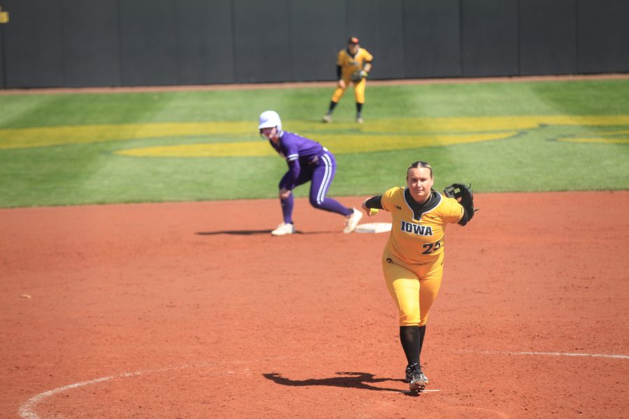 Iowa pitcher Devyn Greer throws a pitch during the first game of a softball doubleheader between Iowa and no. 20 Northwestern on Sunday, April 2, 2023. The Wildcats beat the Hawkeyes 5-0.