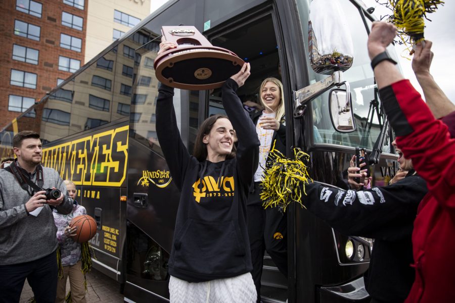 Iowa+guard+Caitlin+Clark+holds+up+a+trophy+during+a+welcome+home+event+for+the+Iowa+women%E2%80%99s+basketball+team%E2%80%99s+NCAA+national+championship+runner-up+finish+outside+of+Hyatt+Regency+Hotel+in+Coralville+on+Monday%2C+April+3%2C+2023.+The+Hawkeyes+were+welcomed+home+by+hundreds+of+fans+following+a+loss+to+LSU+in+the+title+game.+