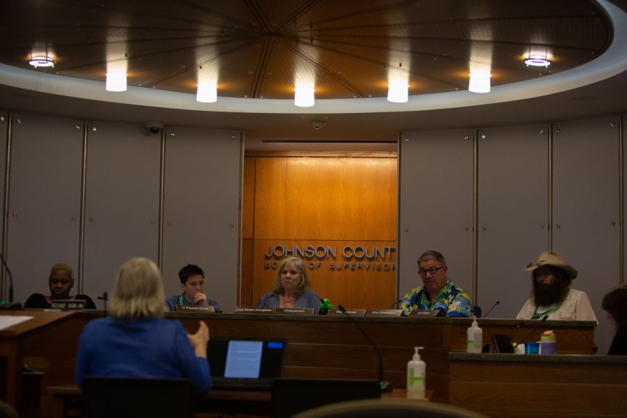 The Board is seen listening to a presentation during the Johnson County Board of Supervisors meeting in the Johnson County Administration Building on Wednesday, April 12, 2023. 
