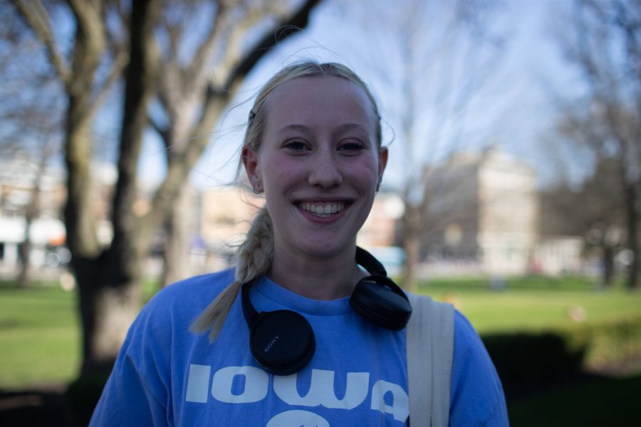 University of Iowa student Erin Mullin poses for a portrait on the Pentacrest in Iowa City on Wednesday, April 12, 2023.