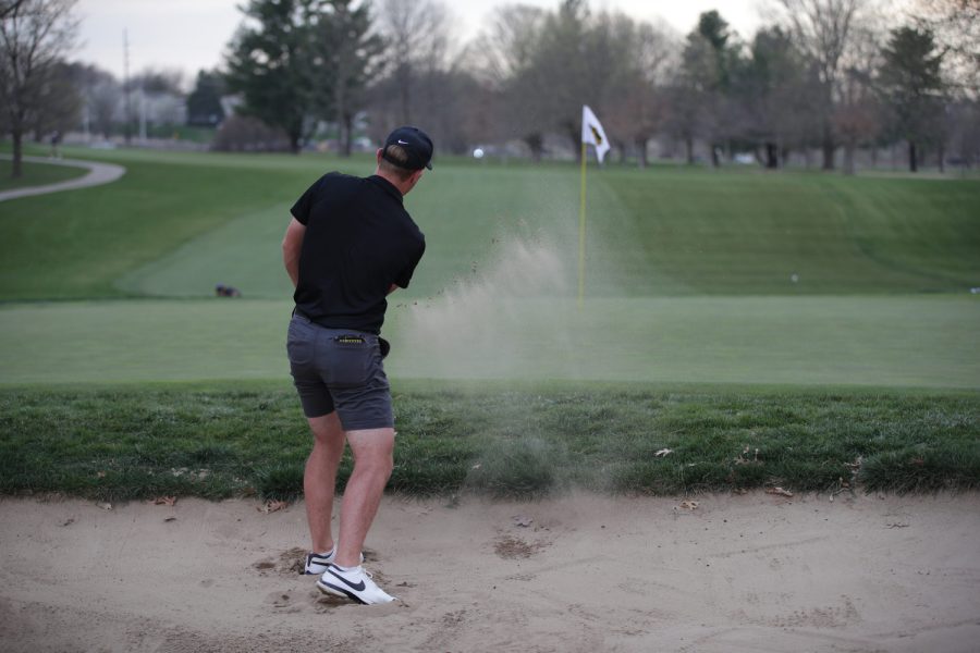 Iowa’s Ian Meyer makes a shot during the Hawkeye invitational at Finkbine Golf Course in Iowa City on Friday, April 14, 2023. The Hawkeyes are leading after round one of three at the two-day tournament with Iowa’s Mac McClear leading the team in fifth place. 