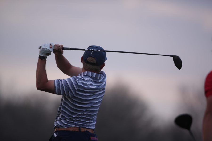 Kansas’ Gunnar Broin takes a shot during the Hawkeye invitational at Finkbine Golf Course in Iowa City on Friday, April 14, 2023. The Hawkeyes are leading after round one of three at the two-day tournament with Iowa’s Mac McClear leading the team in fifth place. 