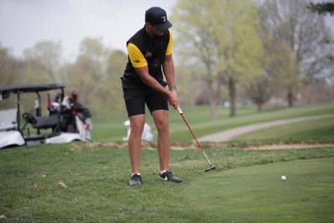 Iowas Hogan Hansen putts during the Hawkeye invitational at Finkbine Golf Course in Iowa City on Saturday, April 15, 2023. The Hawkeyes lead after all three rounds of the two-day tournament, and took both the team and individual sweepstakes with Iowas Mac McClear taking the individual title.