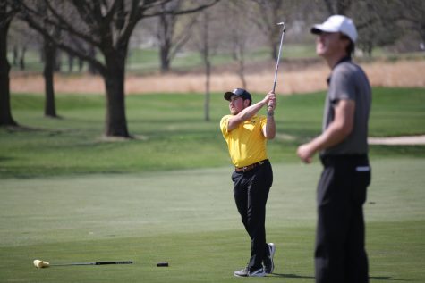 Iowas Mac McClear takes a shot during the Hawkeye invitational at Finkbine Golf Course in Iowa City on Saturday, April 15, 2023. The Hawkeyes lead after all three rounds of the two-day tournament and took both the team and individual sweepstakes with Iowas Mac McClear taking the individual title.